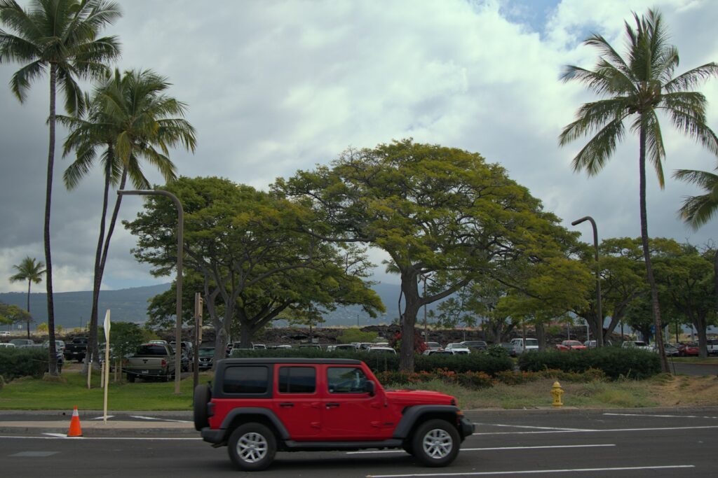 Rental car driving along the Kona coast